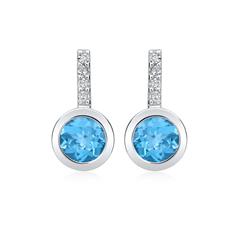 Unique Ohrstecker aus 585 Weißgold mit 2 blauen Topasen & 8 Diamanten